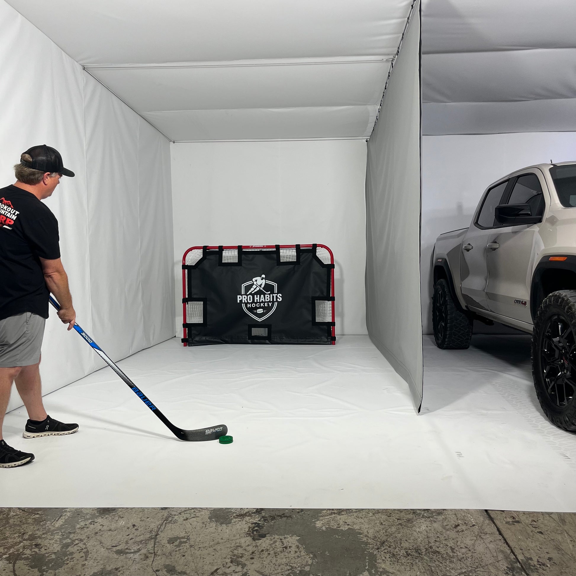 Sliding protective curtain for garages, basements and indoor training areas