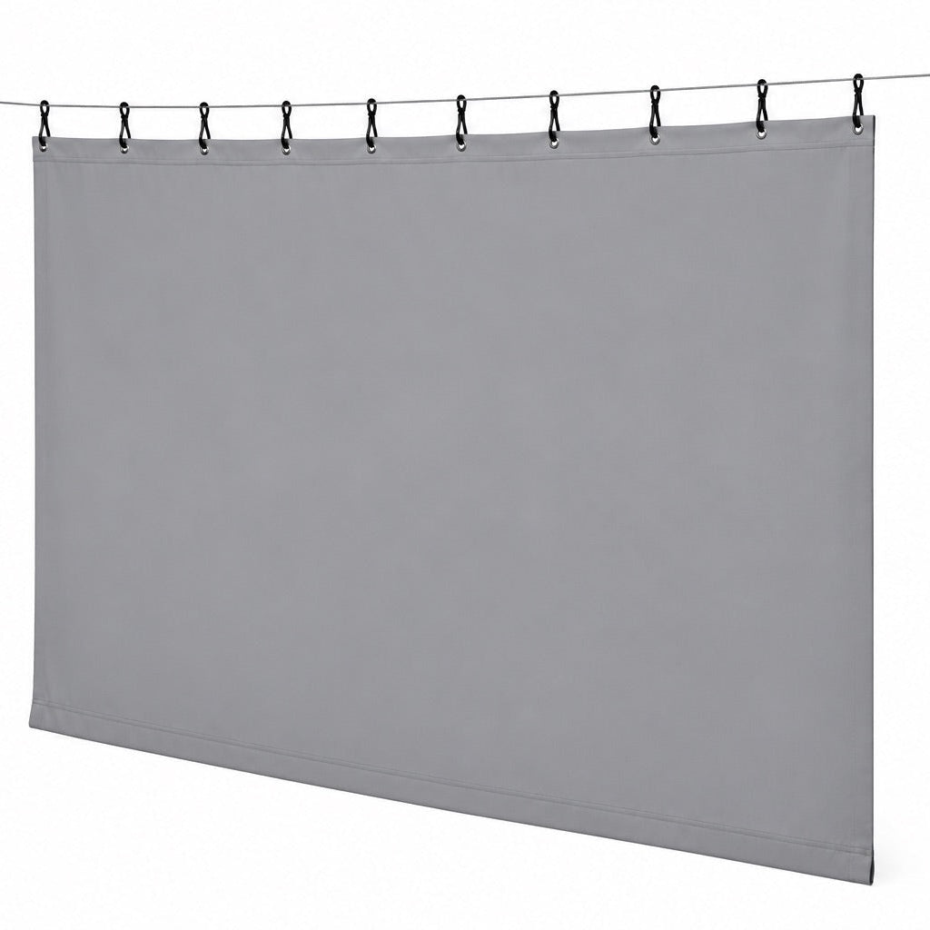 Heavy duty protective curtain with black straps and snaps hanging from a steel cable