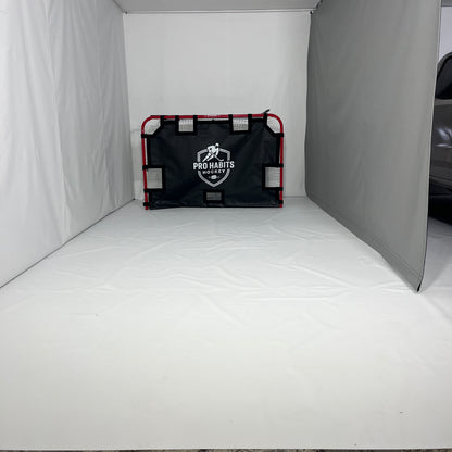 Protective sports curtain set up inside a garage