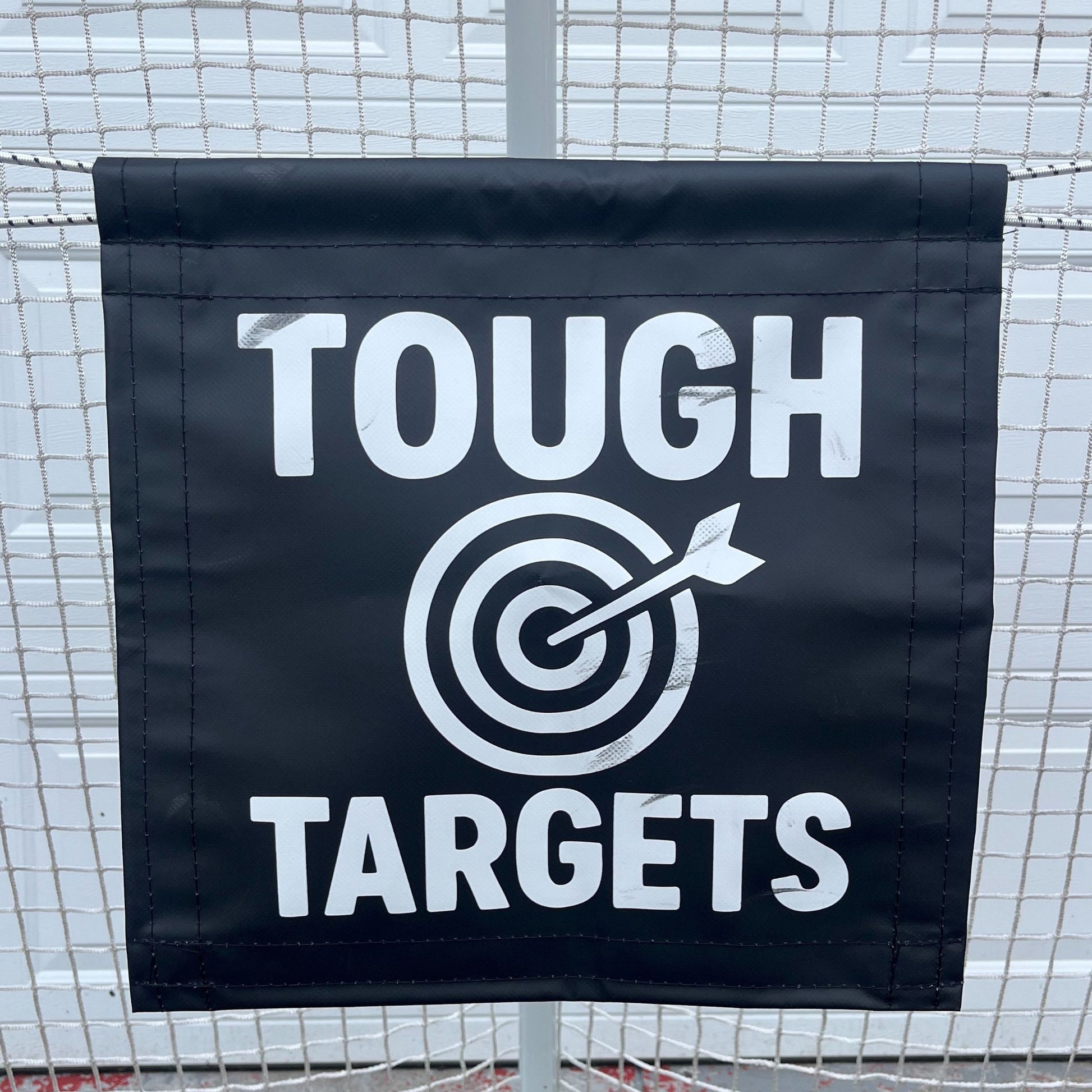 Close-up of a Pro Habits Hockey Tough Target with a durable shooting surface